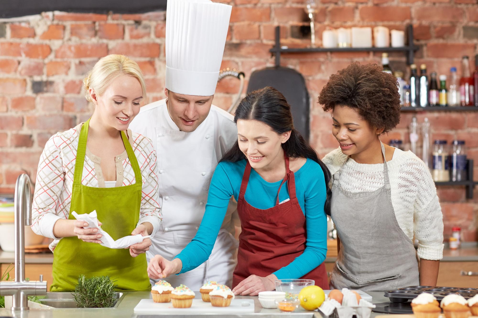 Participants cooking together in workshop